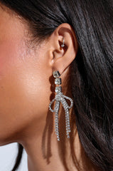 WITH A BOW SILVER EARRING