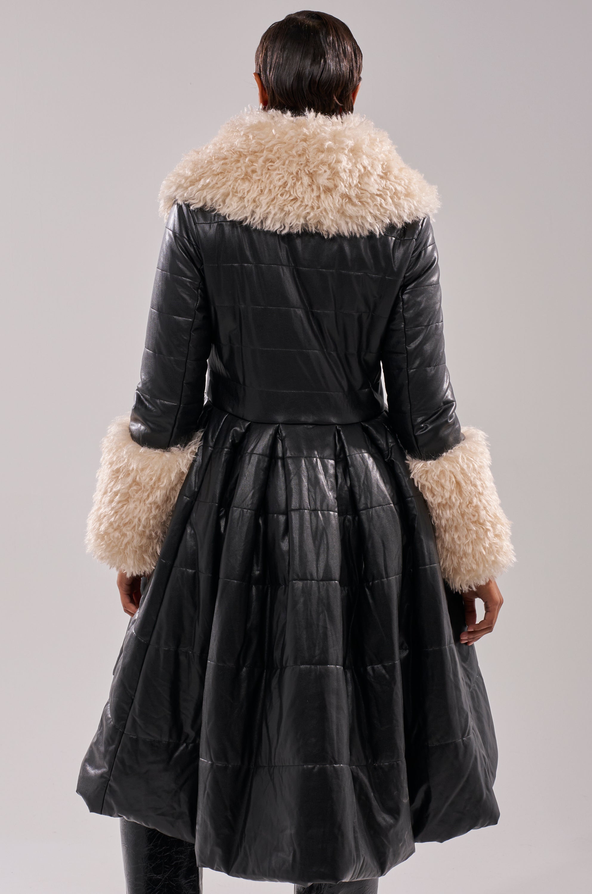 MIDTOWN PEPLUM PUFFER IN FAUX LEATHER