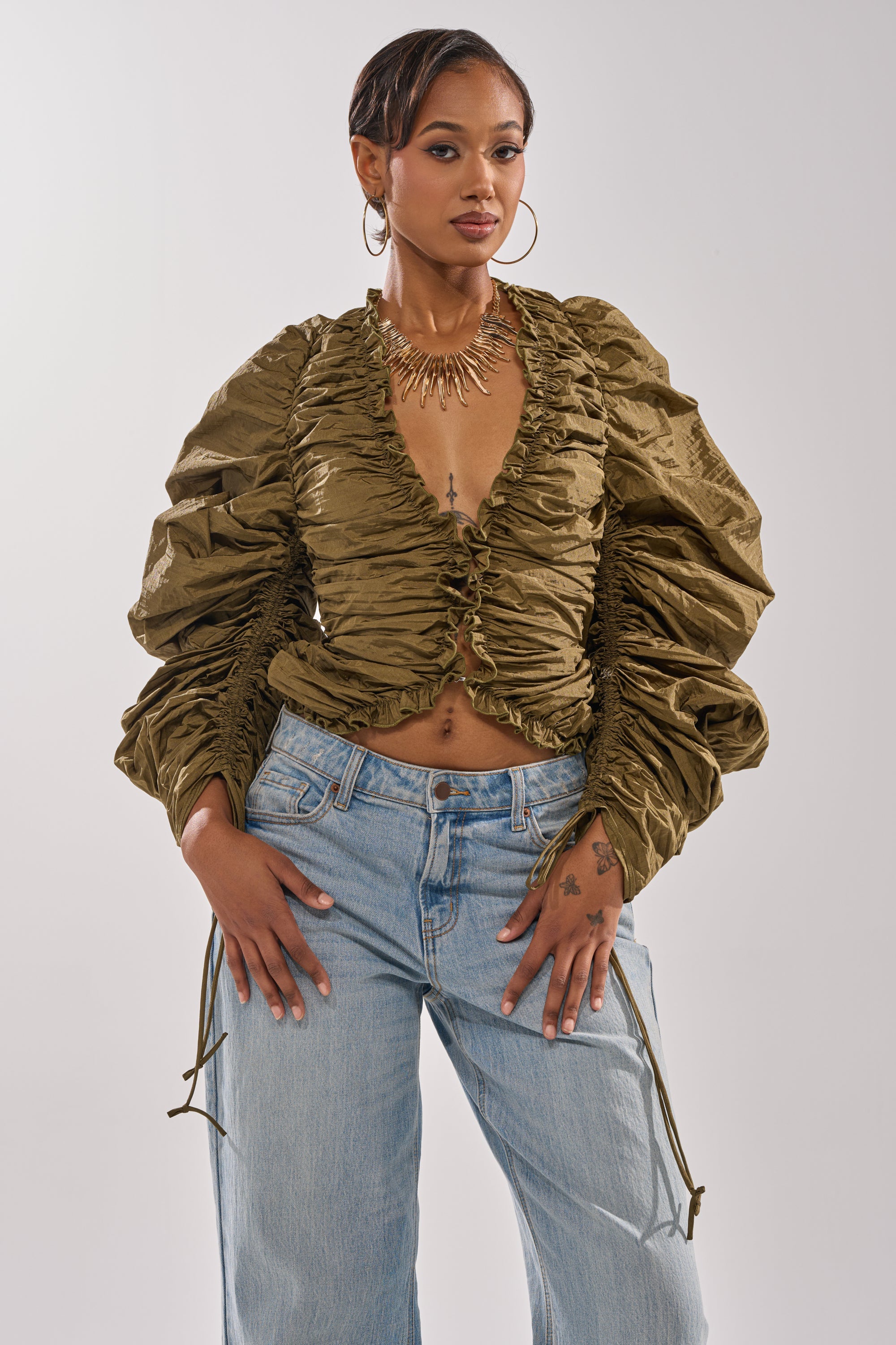 IN IT TO WIN IT RUCHED BLOUSE
