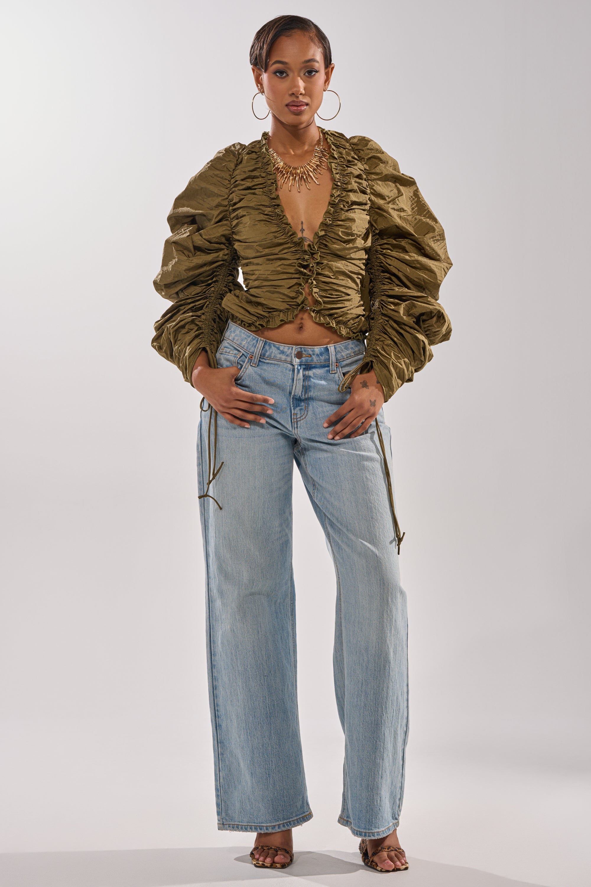 IN IT TO WIN IT RUCHED BLOUSE