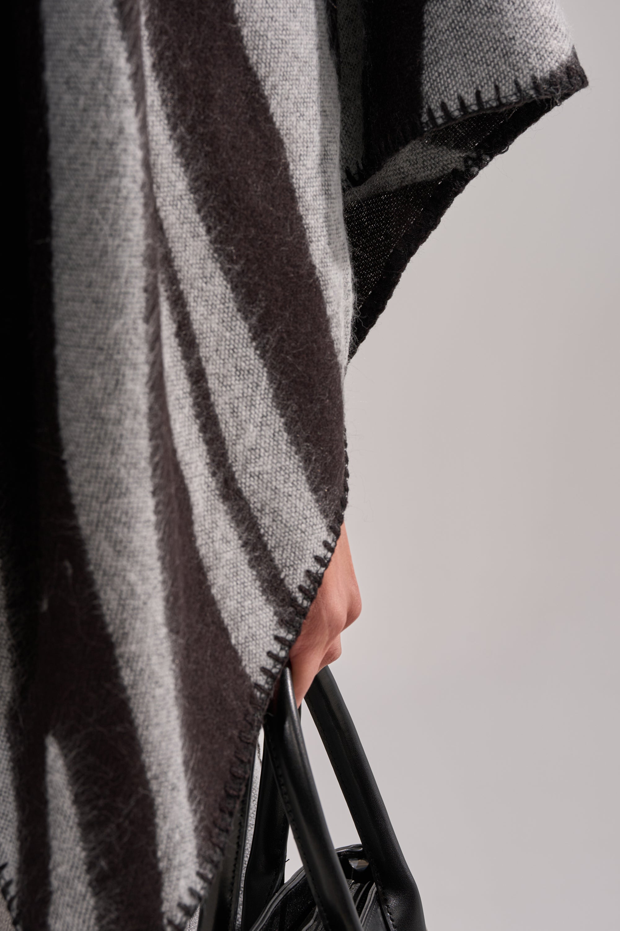 WILD CHILD KNIT PONCHO