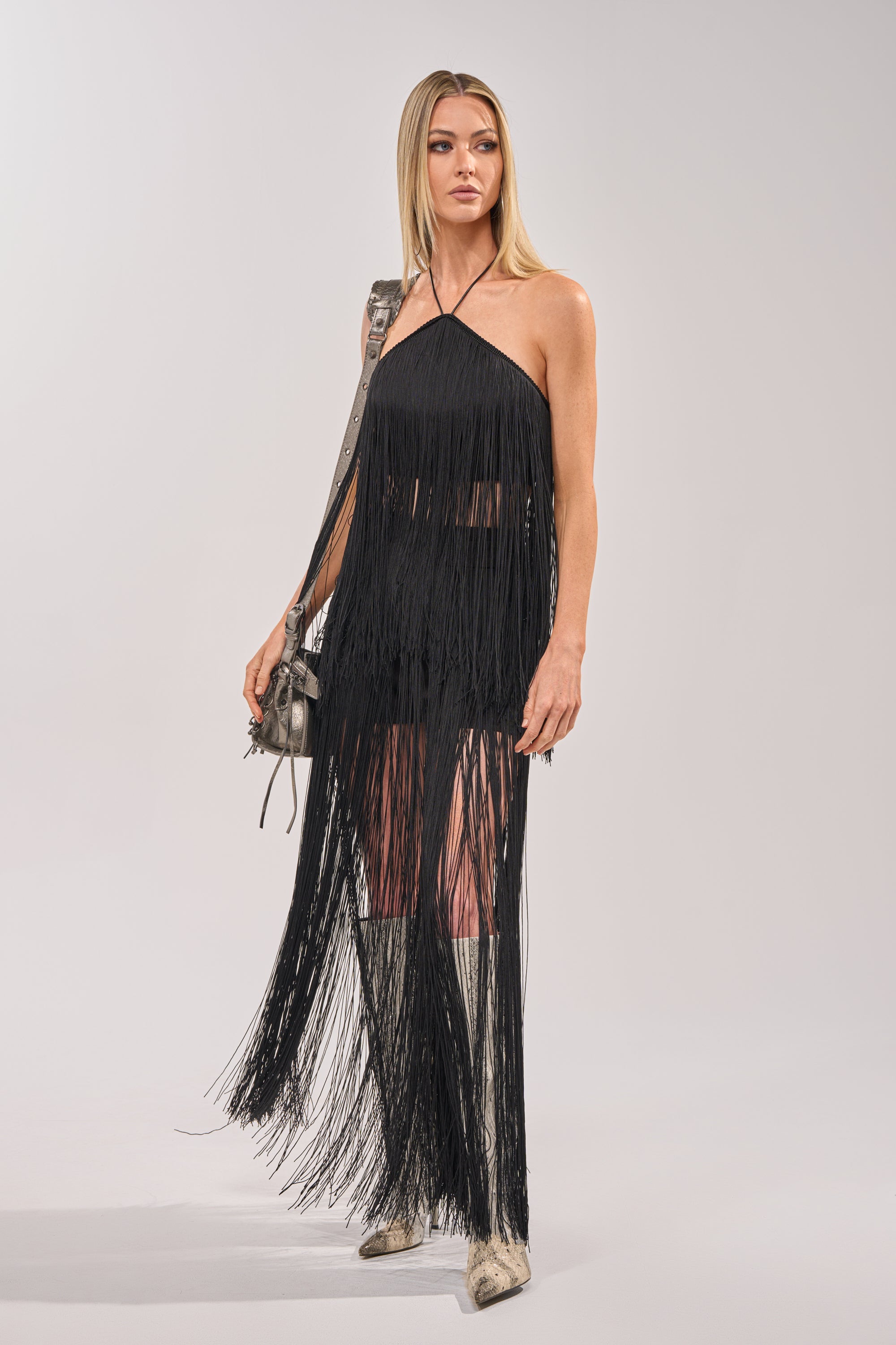 ON THE EDGE FRINGE SKIRT IN BLACK