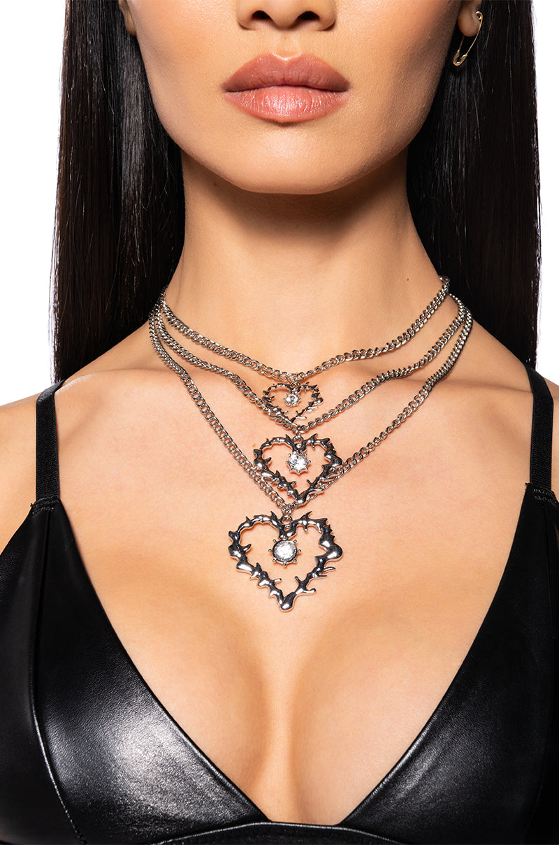 LOVE ME NOT NECKLACE